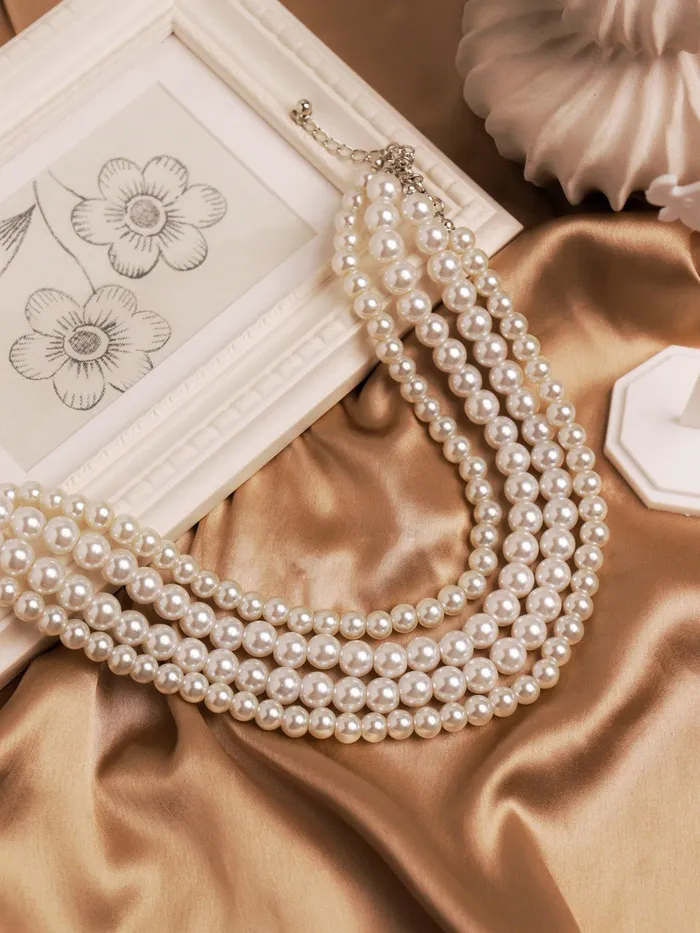 The Pearl Story Ivory Strings of Oyster Necklace Curio Cottage Necklaces The Pearl Story Ivory Strings of Oyster Necklace Curio Cottage Necklaces